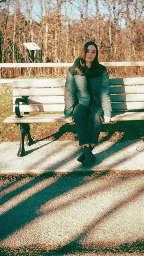 Animated 35mm Film Wigglegram Portrait of Jillian Smart, sitting on a park bench by John Smith